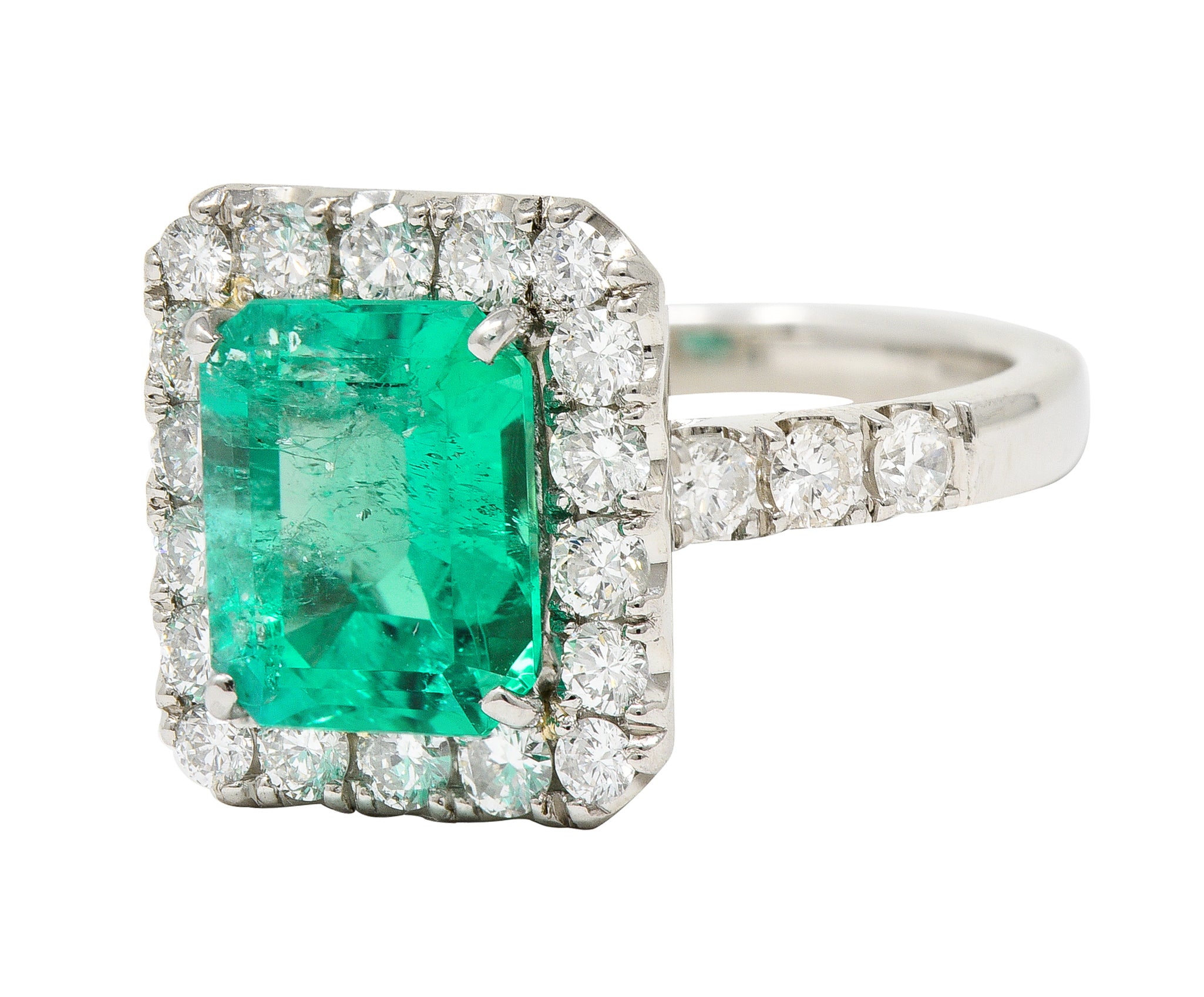 Contemporary 3.50 CTW Colombian Emerald Diamond Platinum Halo Ring GIA Wilson's Estate Jewelry