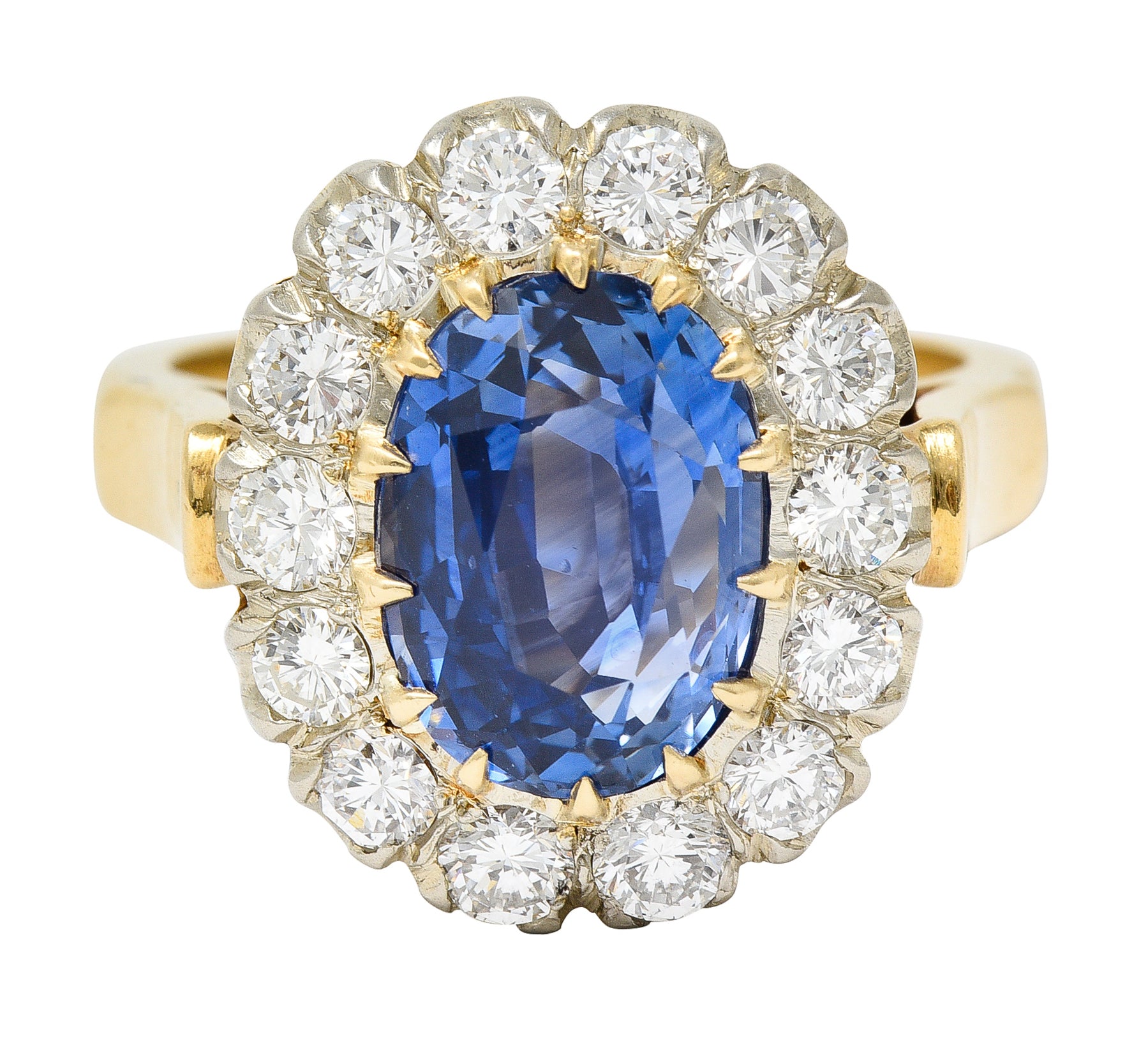 1960's 6.03 CTW Oval Cut Ceylon Sapphire Diamond Platinum-Topped 14 Karat Yellow Gold Vintage Halo Ring GIA Wilson's Estate Jewelry