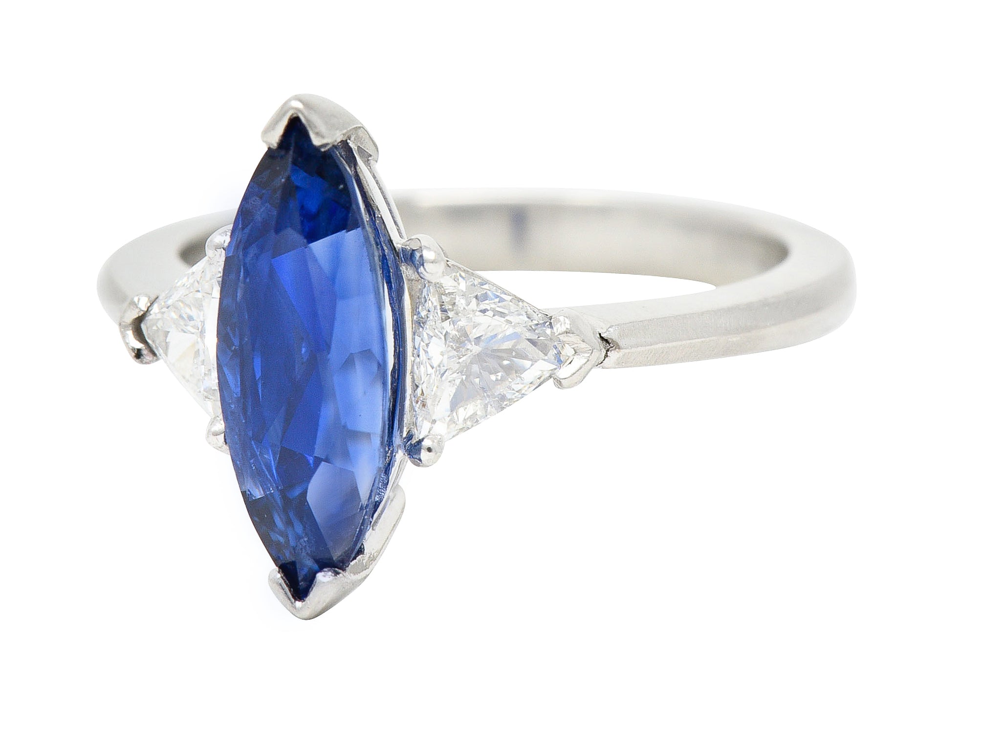 Contemporary 2.44 CTW Marquise Cut Sapphire Trillion Cut Diamond Platinum Three Stone Ring Wilson's Estate Jewelry