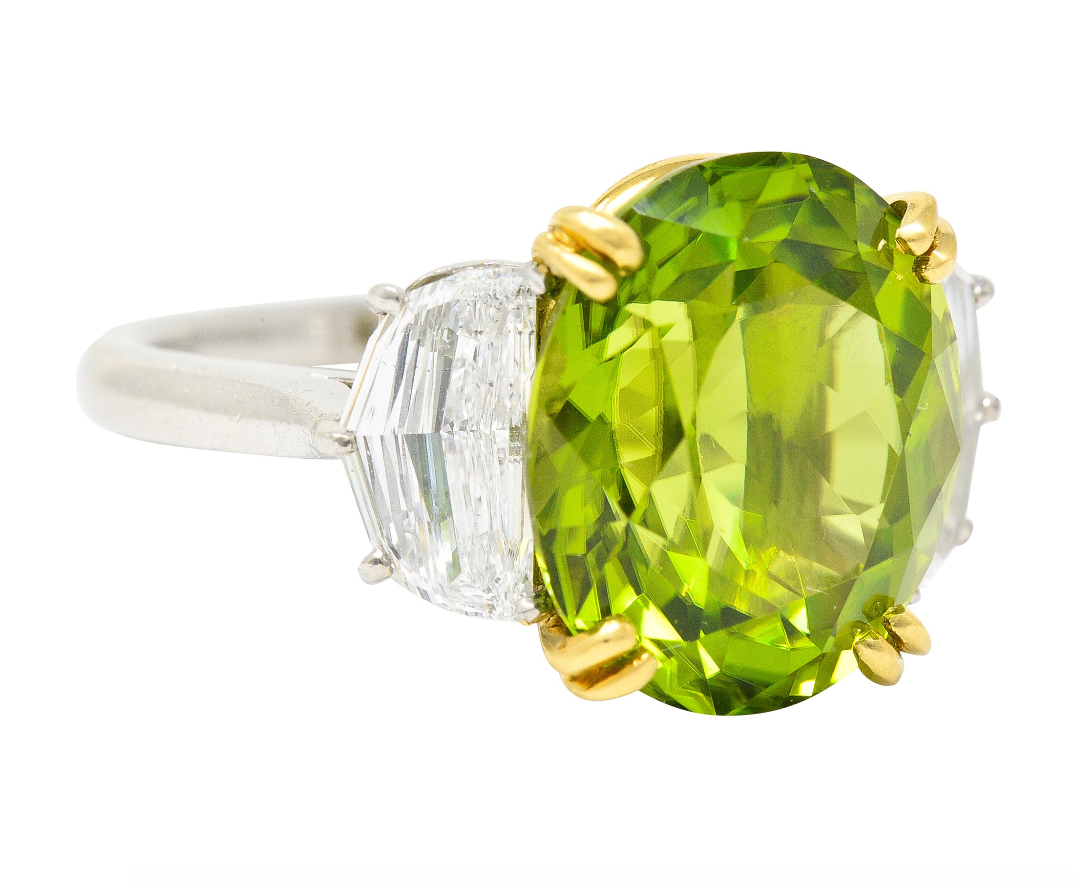 Contemporary 10.51 CTW Oval Cut Peridot Half Moon Step-Cut Diamond Platinum 18 Karat Yellow Gold Three Stone Ring Wilson's Estate Jewelry