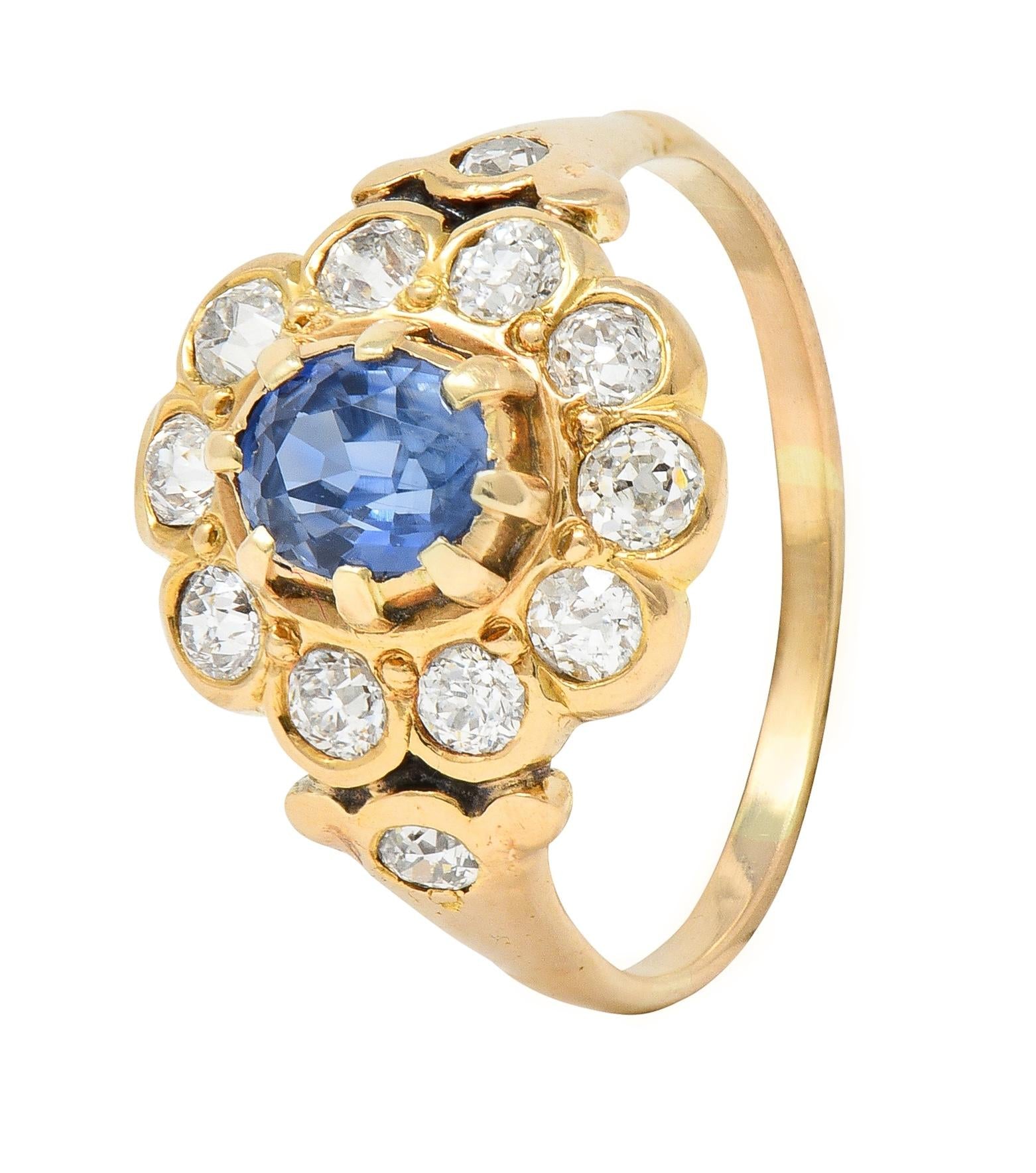 Victorian 1.37 CTW Sapphire Diamond 14 Karat Yellow Gold Antique Halo Ring