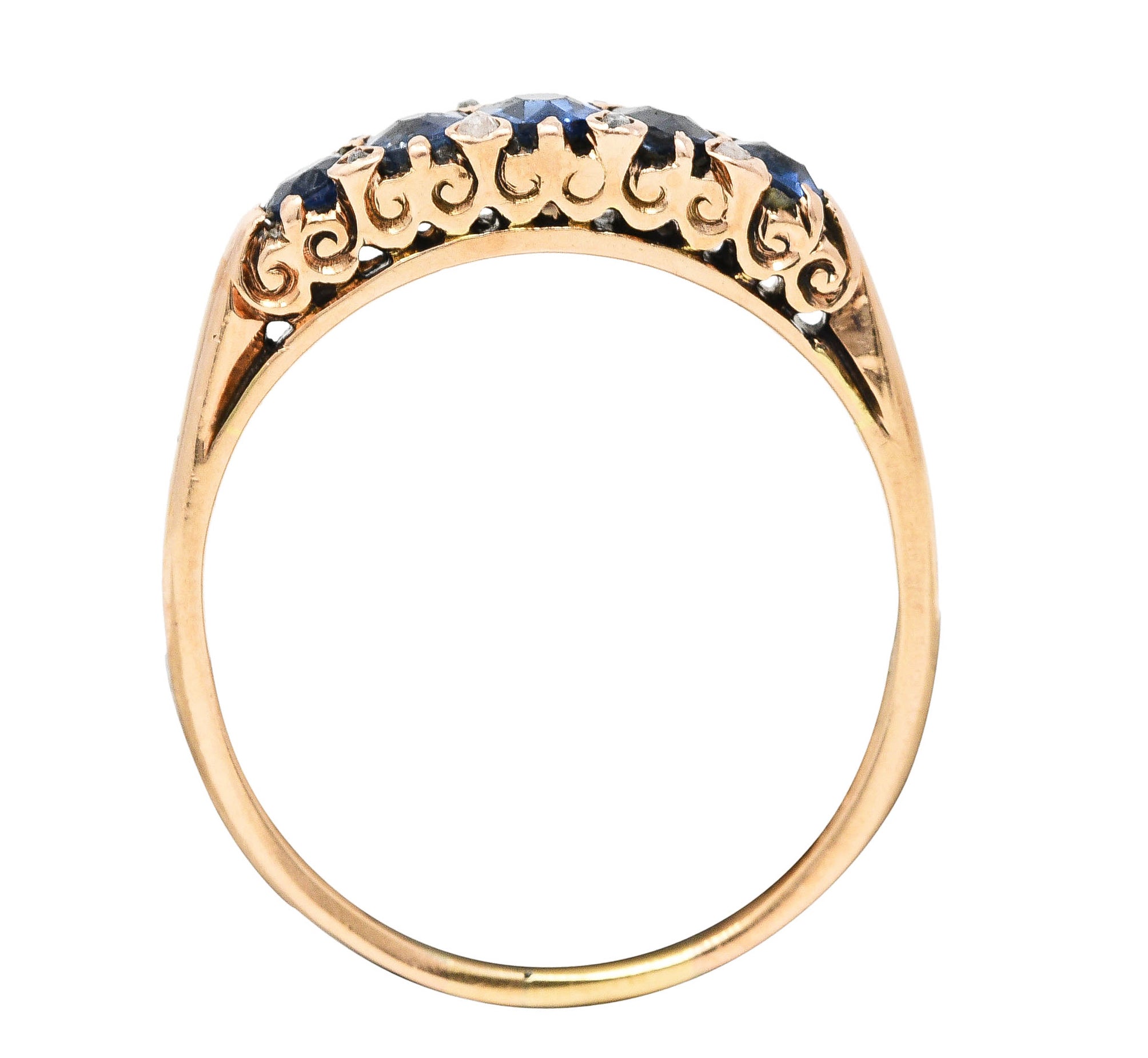 Victorian 1.15 CTW Cushion Cut Sapphire Diamond 14 Karat Yellow Gold Fleur-De-Lis Five Stone Antique Band Ring Wilson's Estate Jewelry