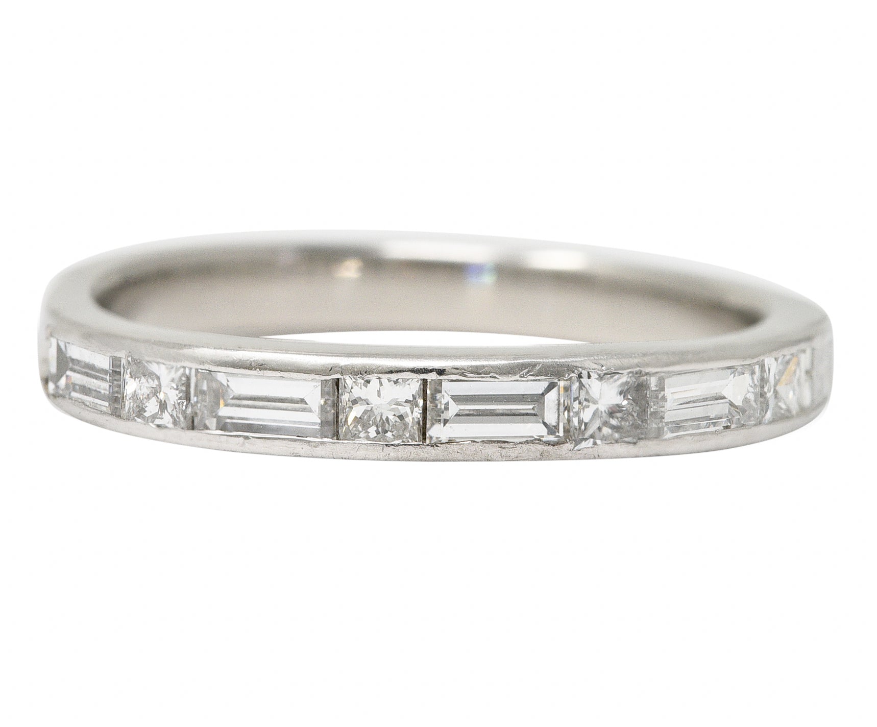 Mid-Century 0.65 CTW Baguette Princess Cut Diamond Platinum Vintage Channel Band Ring Wilson's Estate Jewelry