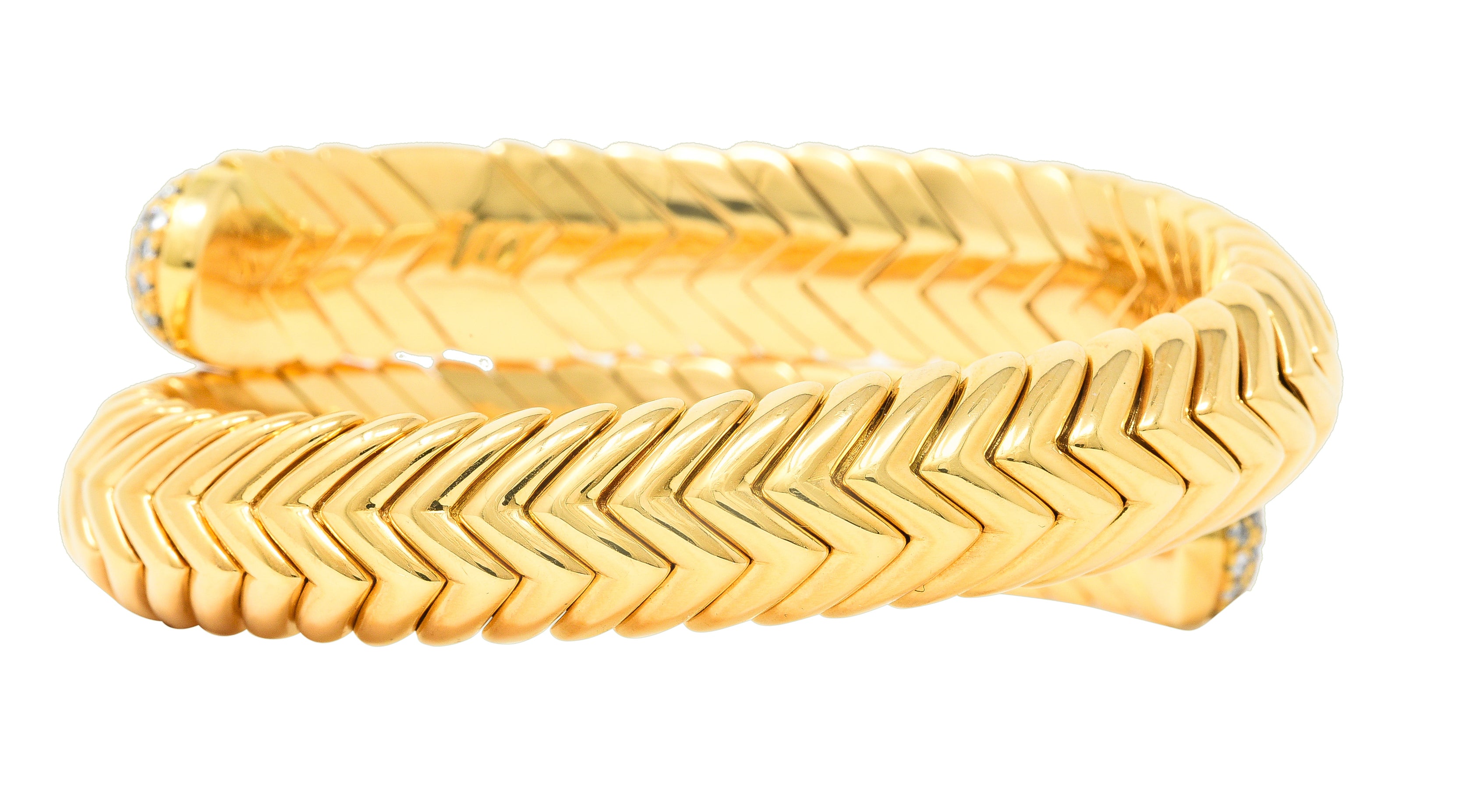 Bulgari 1990's Diamond 18 Karat Yellow Gold Chevron Spiga Wrap Vintage Bangle Bracelet Wilson's Estate Jewelry