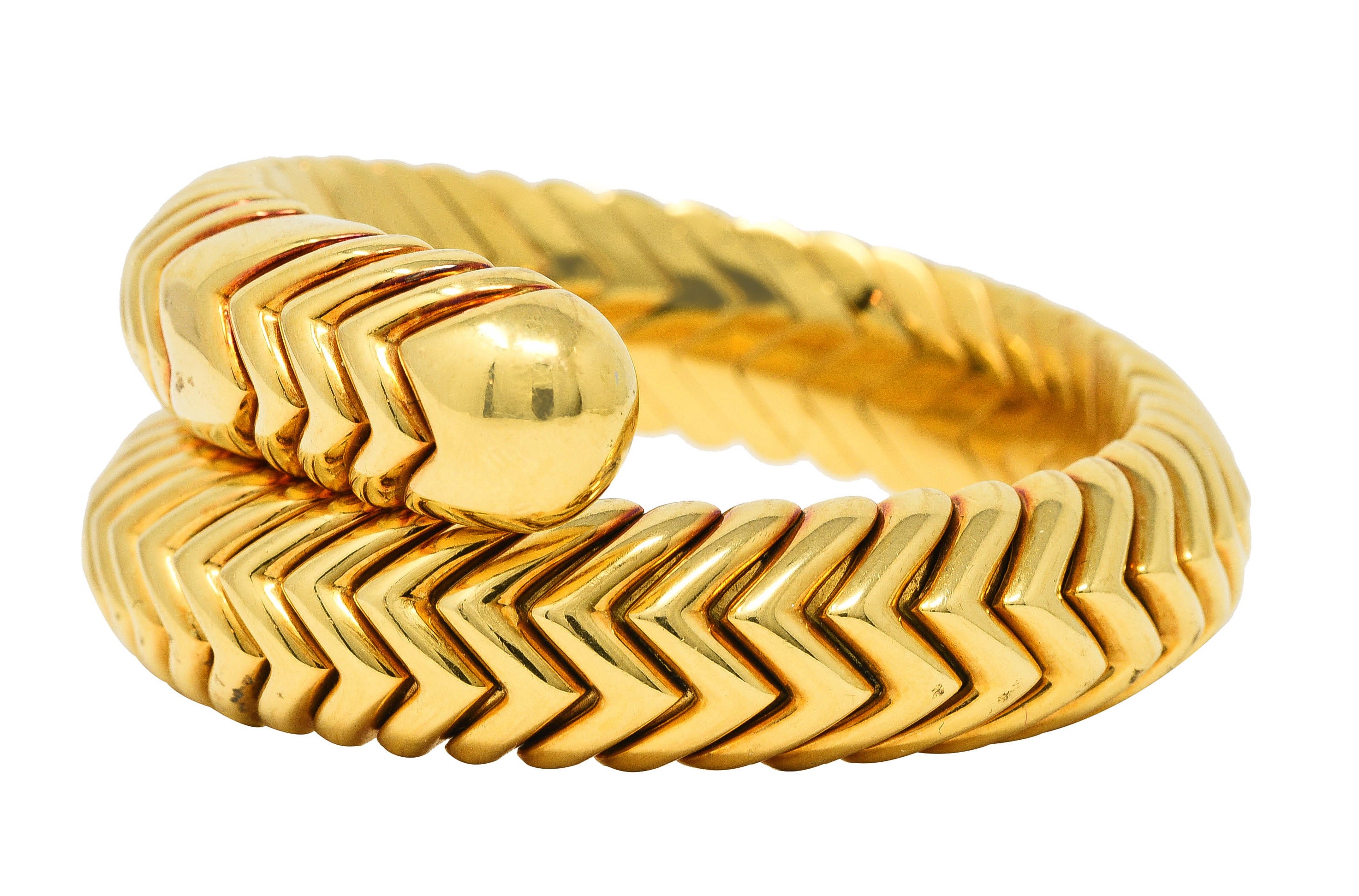 Bulgari 1990's 18 Karat Yellow Gold Chevron Spiga Wrap Vintage Bangle Bracelet Wilson's Estate Jewelry