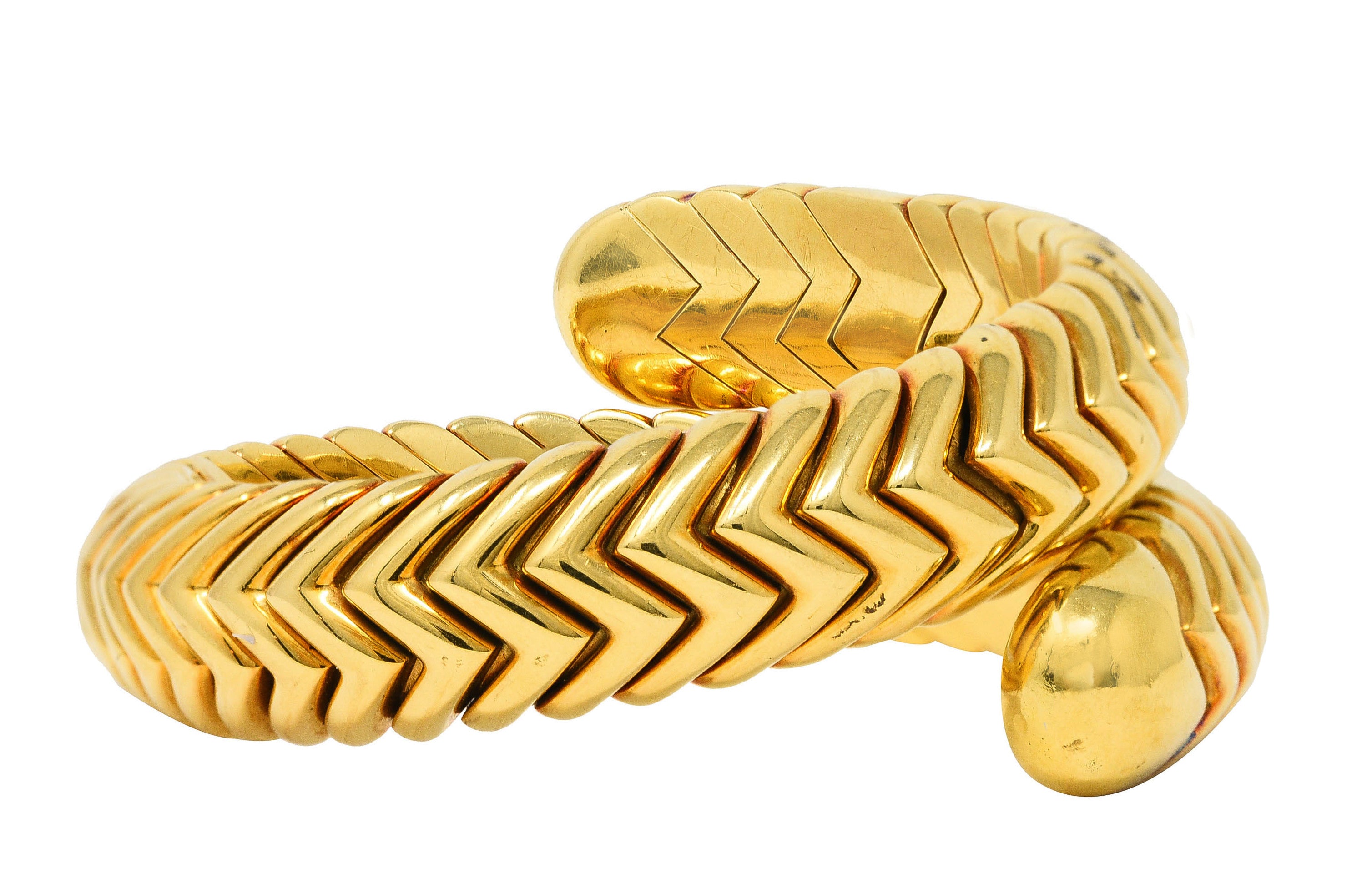 Bulgari 1990's 18 Karat Yellow Gold Chevron Spiga Wrap Vintage Bangle Bracelet Wilson's Estate Jewelry