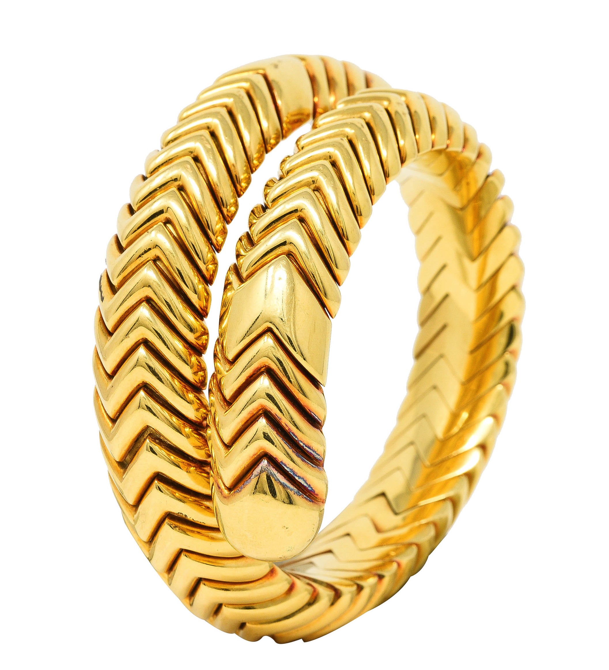 Bulgari 1990's 18 Karat Yellow Gold Chevron Spiga Wrap Vintage Bangle Bracelet Wilson's Estate Jewelry