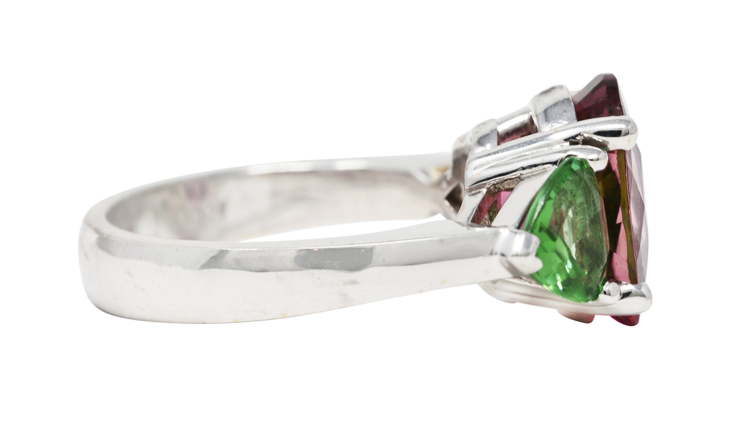 Contemporary 7.23 CTW Oval Cut Pink Tourmaline Peridot 18 Karat White Gold Three Stone Ring Wilson's Estate Jewelry