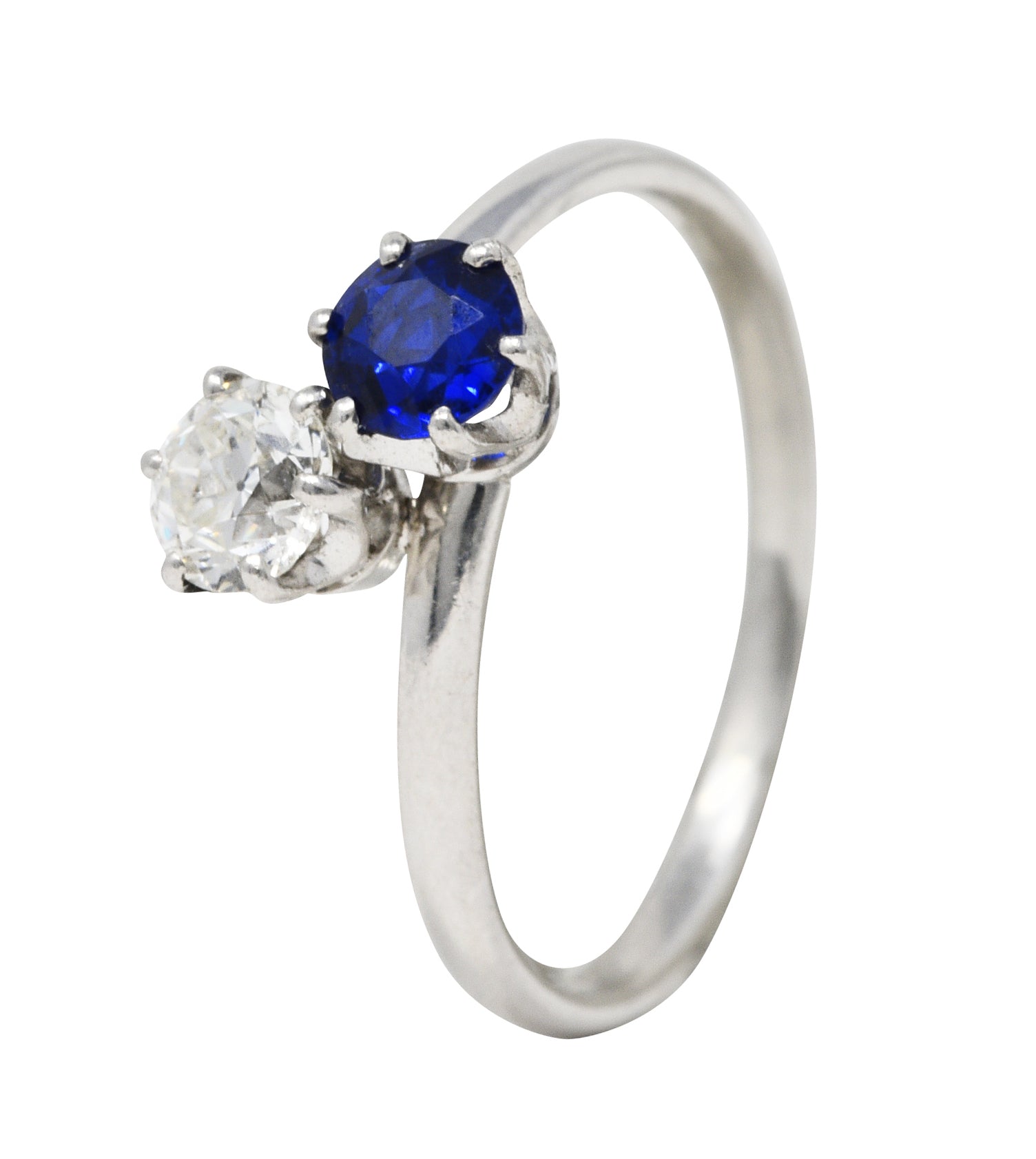 Tiffany & Co. Edwardian 0.79 CTW Sapphire Diamond Platinum Toi Et Moi Antique Bypass Ring Wilson's Estate Jewelry