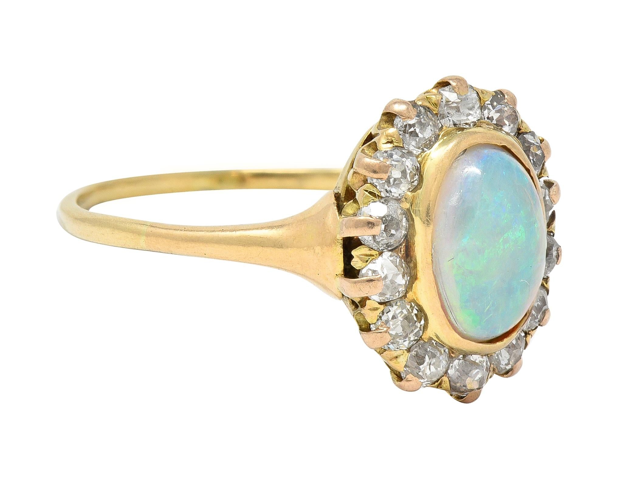 Victorian 0.86 CTW Opal Cabochon Diamond 14 Karat Yellow Gold Antique Halo Ring