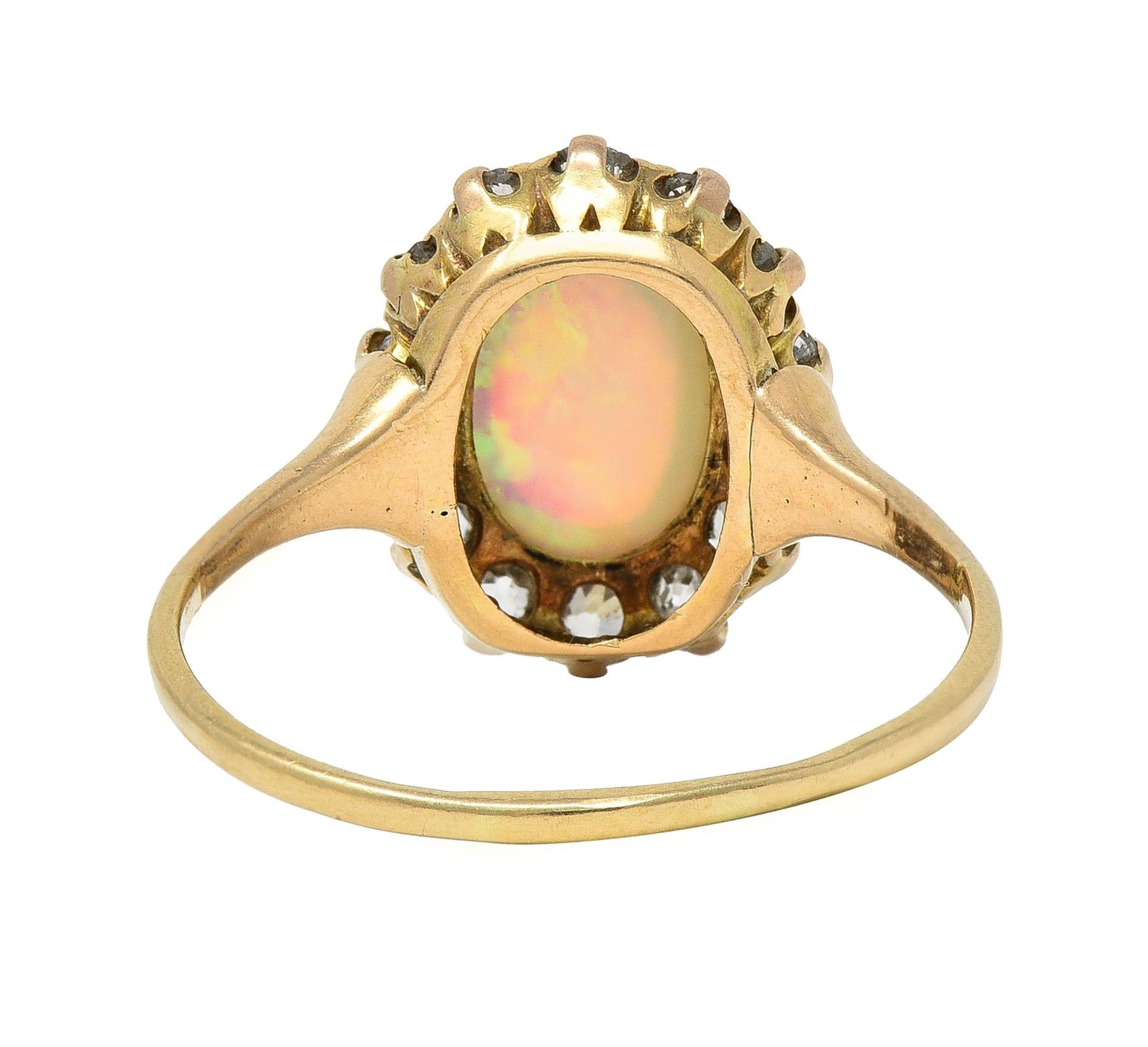 Victorian 0.86 CTW Opal Cabochon Diamond 14 Karat Yellow Gold Antique Halo Ring