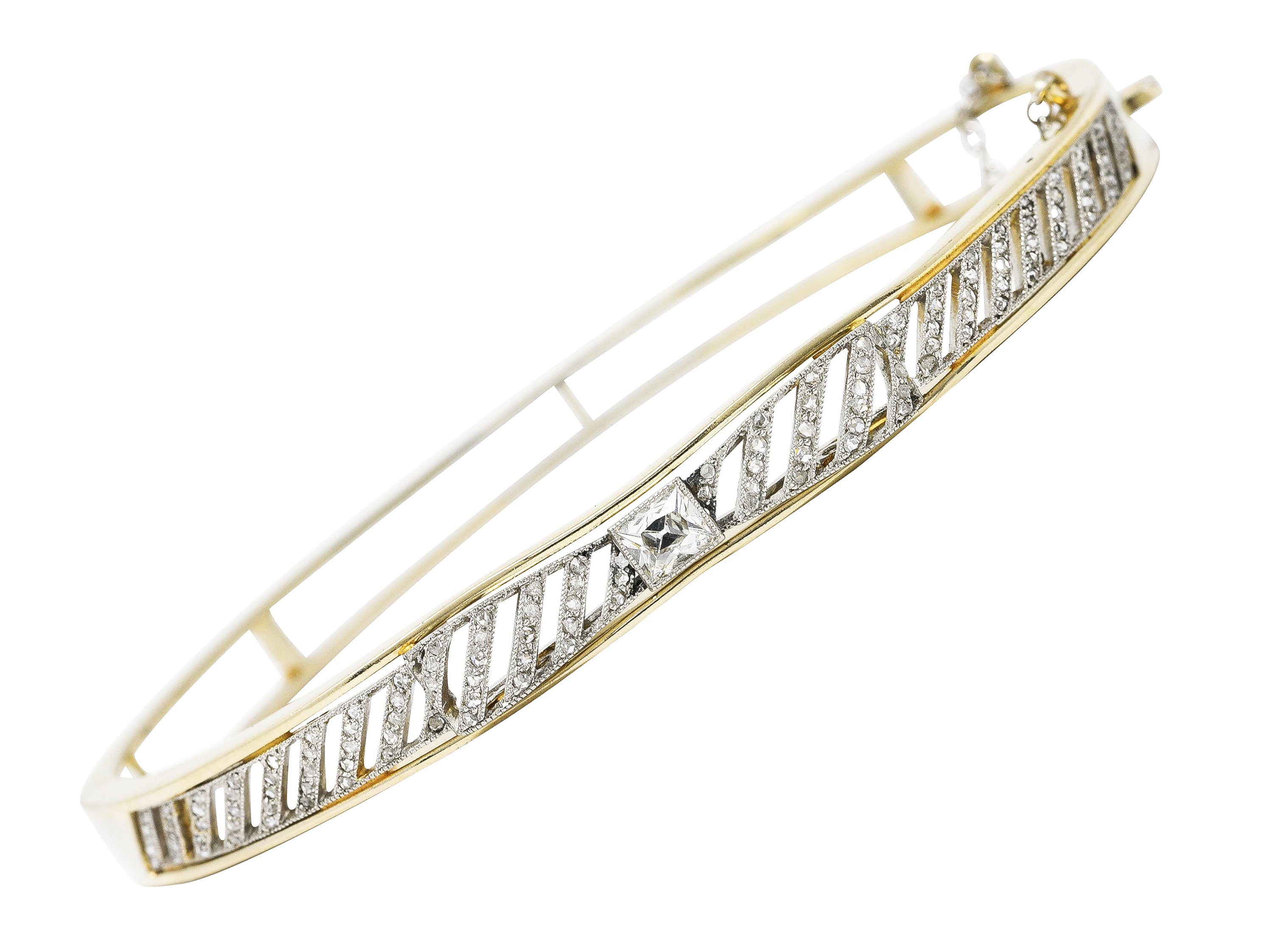 Edwardian 1.04 CTW French Cut Diamond Platinum-Topped 14 Karat Yellow Gold Bow Antique Bangle Bracelet Wilson's Estate Jewelry