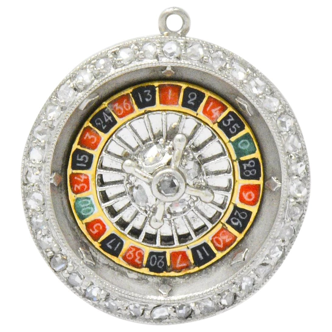 Art Deco Diamond Enamel Gold Platinum Roulette Charm Wilson's Estate Jewelry