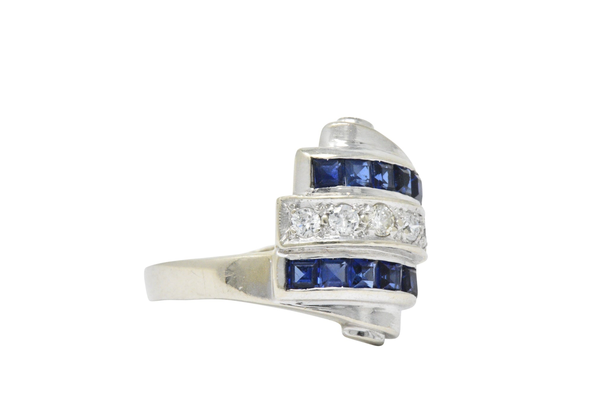 Retro 0.80 CTW Diamond Sapphire 14 Karat White Gold Scrolled Bypass Ring Wilson's Estate Jewelry