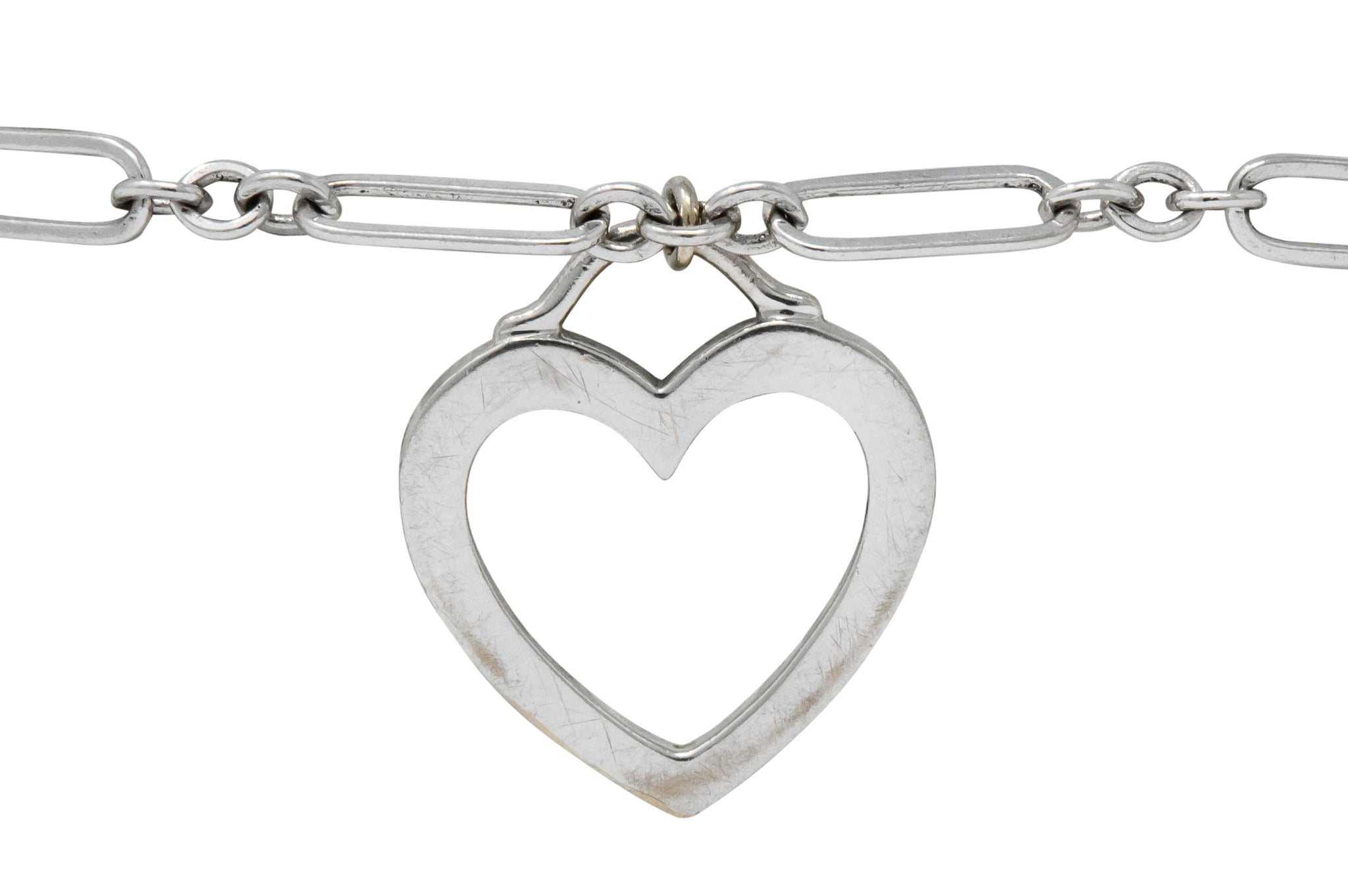 Tiffany & Co. 18 Karat White Gold Link Heart Charm Bracelet - Wilson's Estate Jewelry