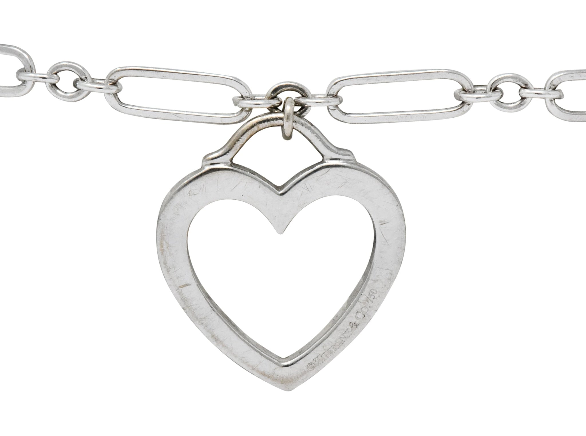 Tiffany & Co. 18 Karat White Gold Link Heart Charm Bracelet - Wilson's Estate Jewelry